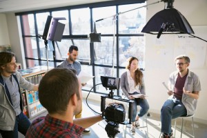 Business people shooting video tutorial